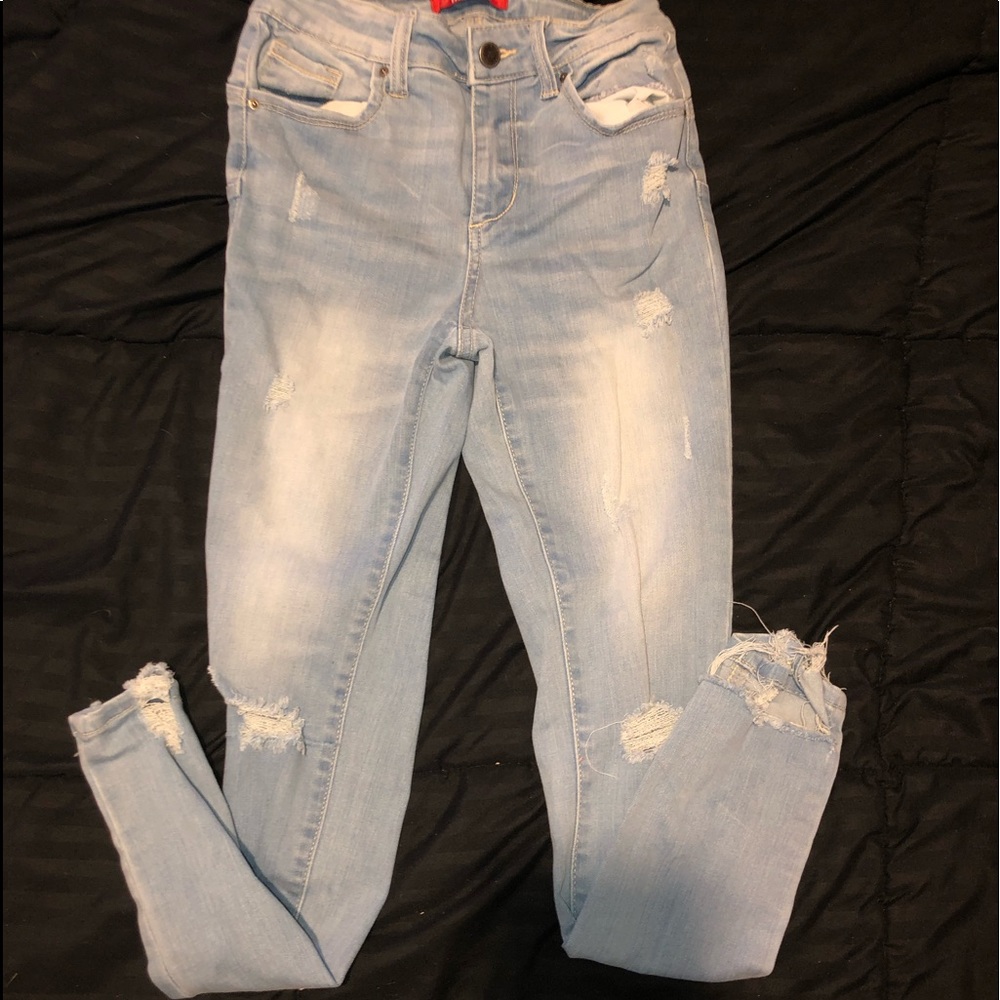 ripped light blue jeans